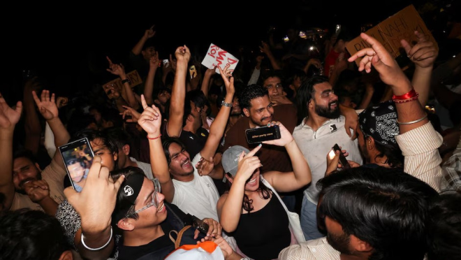 Cockroach Janta Party (CJP) supporters celebrate after the resignation of Education Minister Dharmendra Pradhan over National Eligibility cum Entrance Test (NEET) examination paper leaks, at Jantar Mantar in New Delhi, India, July 25, 2026. Photo: REUTERS/Priyanshu Singh