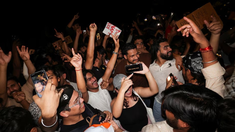 Cockroach Janta Party (CJP) supporters celebrate after the resignation of Education Minister Dharmendra Pradhan over National Eligibility cum Entrance Test (NEET) examination paper leaks, at Jantar Mantar in New Delhi, India, July 25, 2026. Photo: REUTERS/Priyanshu Singh