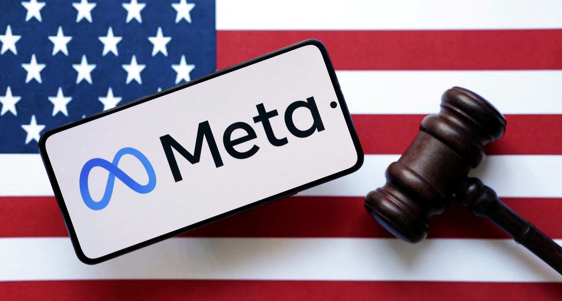 FILE PHOTO: Illustration shows Meta logo, U.S. flag and judge’s gavel