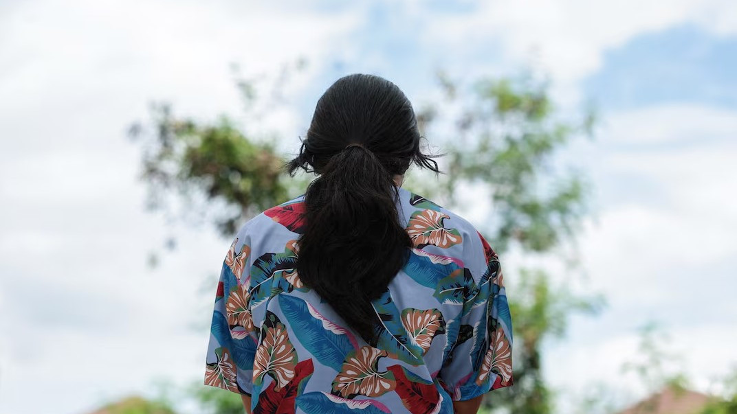 Khim, a 14-year-old eighth-grade student at Debsirin Nonthaburi School, poses for a picture at her home during an exclusive interview with Reuters about what she saw and witnessed during the shooting incident at the school, a day after the incident, in Bang Kruai district, Nonthaburi province, on the outskirts of Bangkok, Thailand, August 8, 2026. Photo: REUTERS/Chalinee Thirasupa