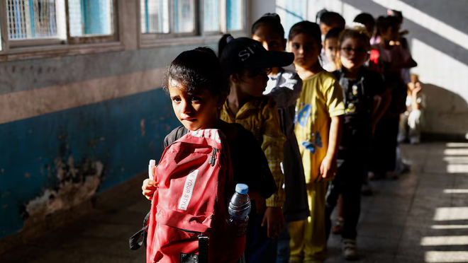 palestinian_students_attend_the_first_day_of_the_new_school_year_at_an_unrwa_school_in_nuseirat_2