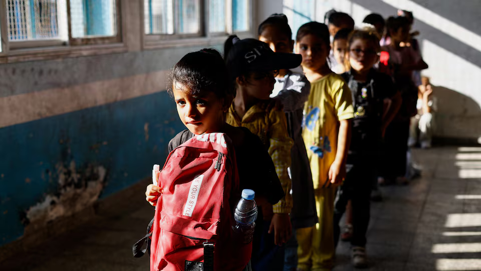 palestinian_students_attend_the_first_day_of_the_new_school_year_at_an_unrwa_school_in_nuseirat_2